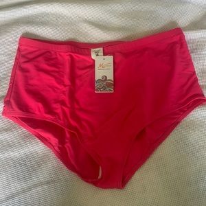 Micosuza a pink swim bottoms.